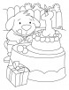 A puppy with the birthday cake coloring pages