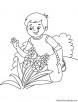 Boy taking care orchid coloring page